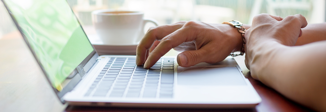 Person typing on a laptop