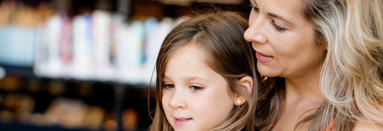 woman reading with child