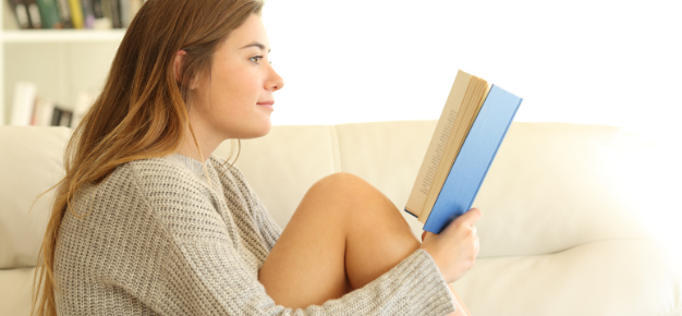 Teen girl reading book