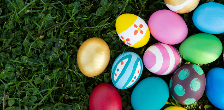 photo of easter eggs on green lawn