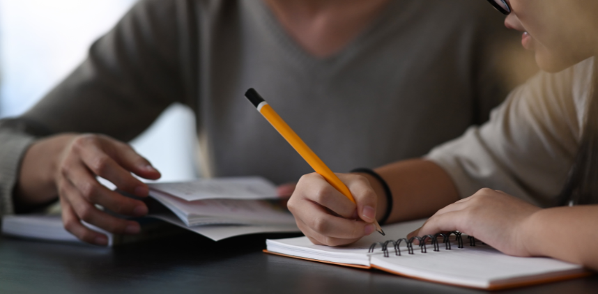 photo of a child writing 