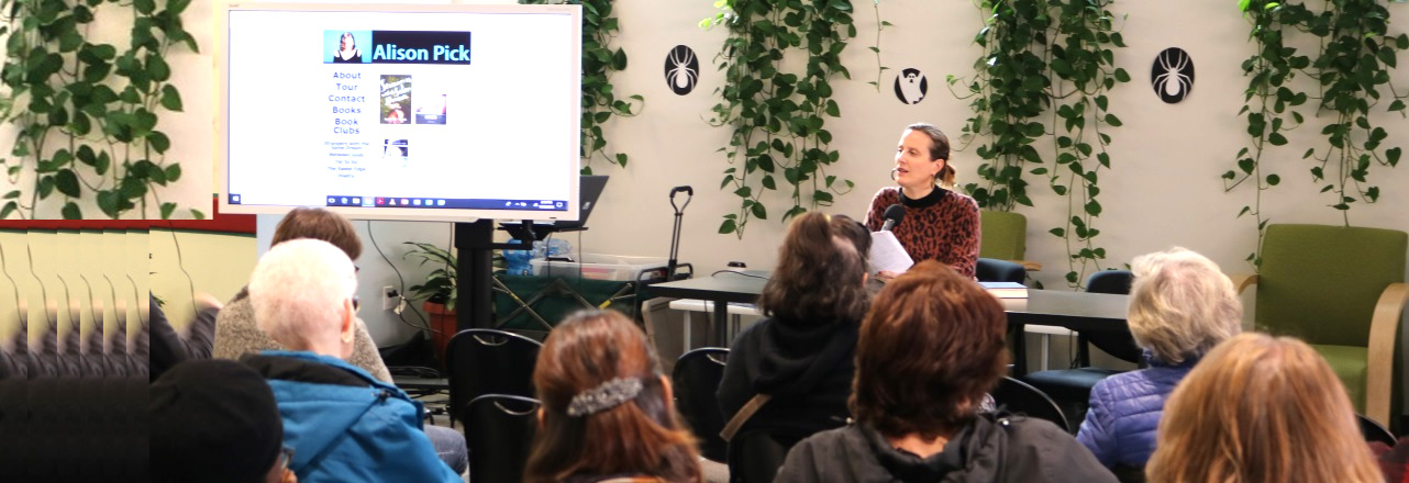 Woman presenting in front of group